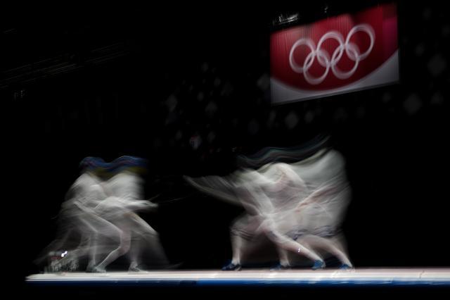 世俱杯买球-日媒:菅义伟不考虑取消奥运 男重团体金牌“悲愿”